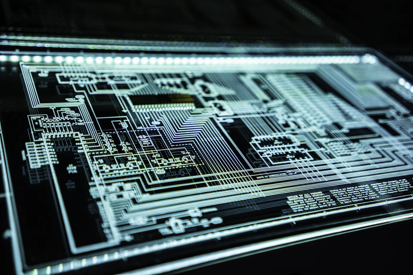 Illuminated circuit board representing AI hardware